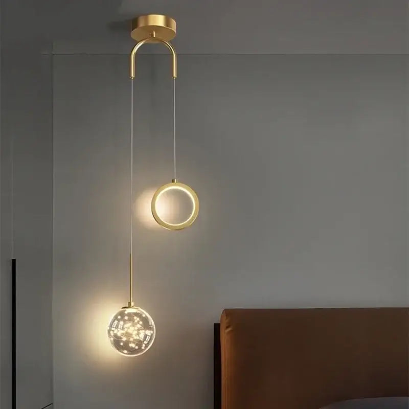 Modern gold ring led pendant light with crystal features a sleek circular fixture and glowing ring and globe for decorbites gold ring decor