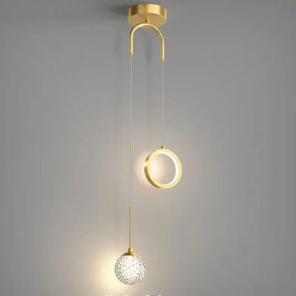 Modern gold ring led pendant light with decorbites gold ring design featuring a curved mount and crystal globe for living room decor