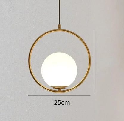 Modern gold ring pendant light with frosted glass globe in a sleek gold-toned frame decorbites gold ring light fixture