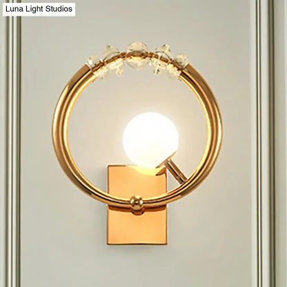 Modern gold ring wall sconce with clear crystal accents and spherical bulb for bedroom lighting 110v-120v ring wall