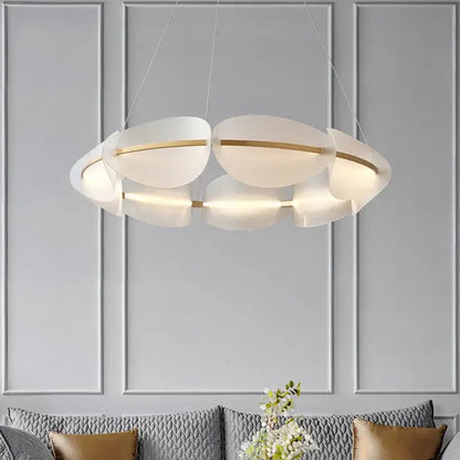 Modern white pendant light with gold ring accents and white acrylic petal shades for dining room decorbites gold ring