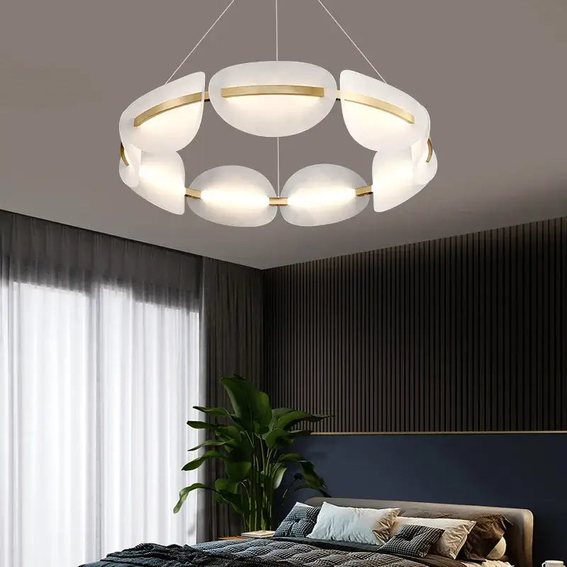 Modern gold ring pendant light with frosted white acrylic petal panels for dining room decorbites gold ring style
