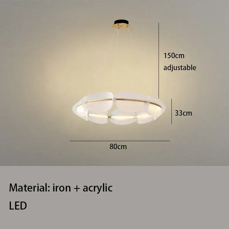 Modern gold ring pendant light with white acrylic petals and iron frame emitting warm led illumination for dining room decorbites gold ring