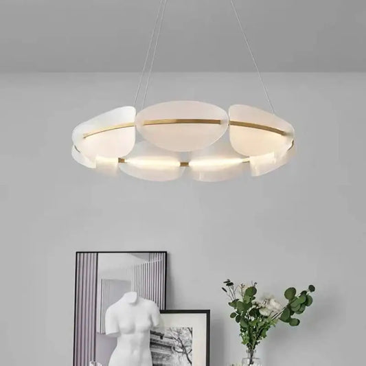 Modern gold ring pendant light with white acrylic frosted glass petals and gold-toned metallic accents for dining room decorbites gold ring