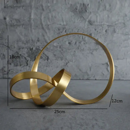 Modern gold rope knot metal sculpture with interlocking circular bands for stylish home decor and decorbites gold rope collection
