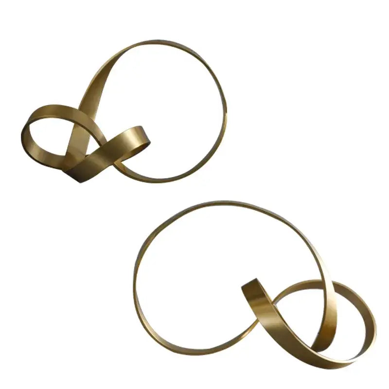 Modern gold rope knot metal sculpture with intertwined circular bands for home decor by decorbites gold rope