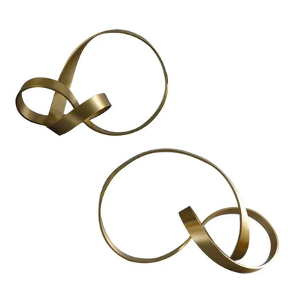 Modern gold rope knot metal sculpture with intertwined circular bands for home decor by decorbites gold rope