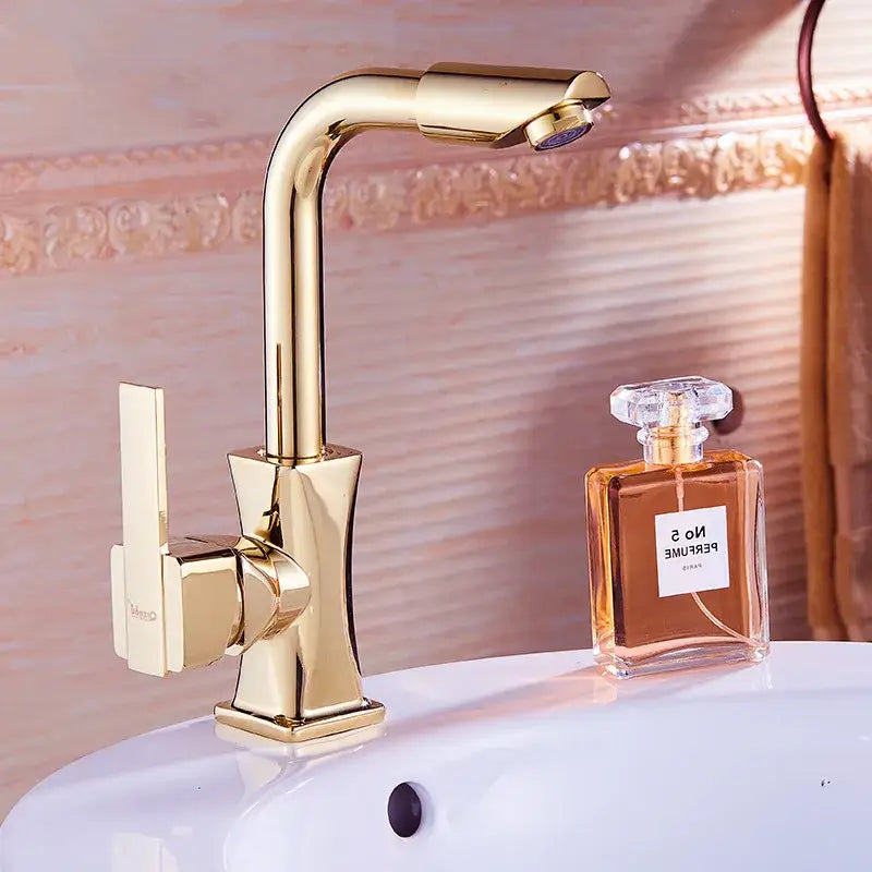 Modern gold brass basin faucet with single handle curved spout and square base for bathroom decorbites brass basin mixer