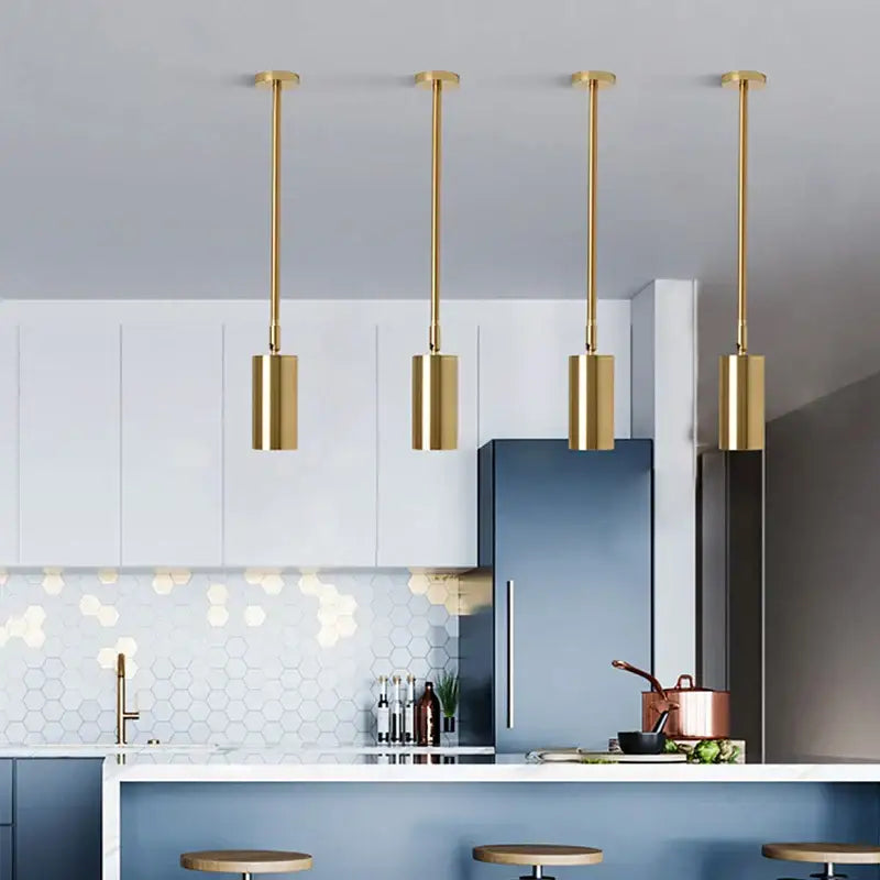 Four sleek gold finished cylindrical modern rotating led spotlights pendant lights for kitchen or dining room use