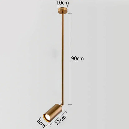 A sleek modern gold finished adjustable pendant light with cylindrical head and slender stem featuring rotating led spotlights