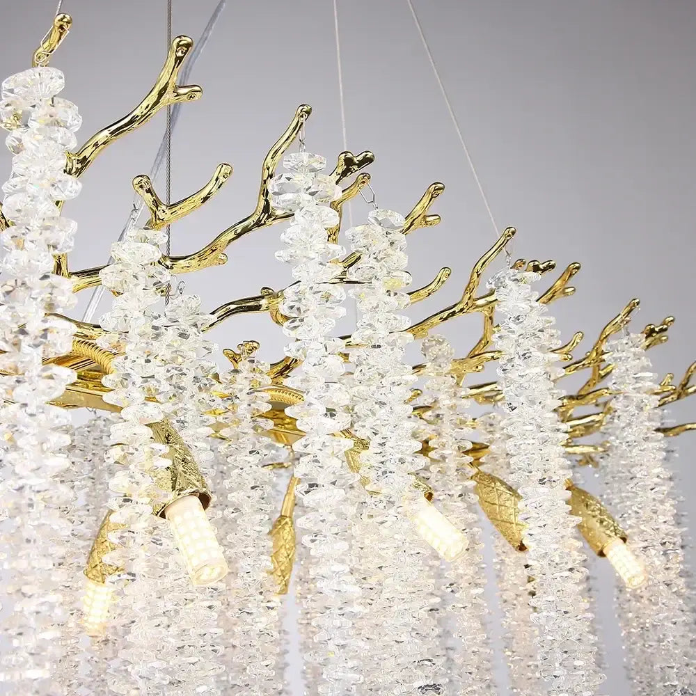 Modern gold round crystal branches chandelier featuring golden textured accents and cascading clear crystal beads for dining room decorbites gold round