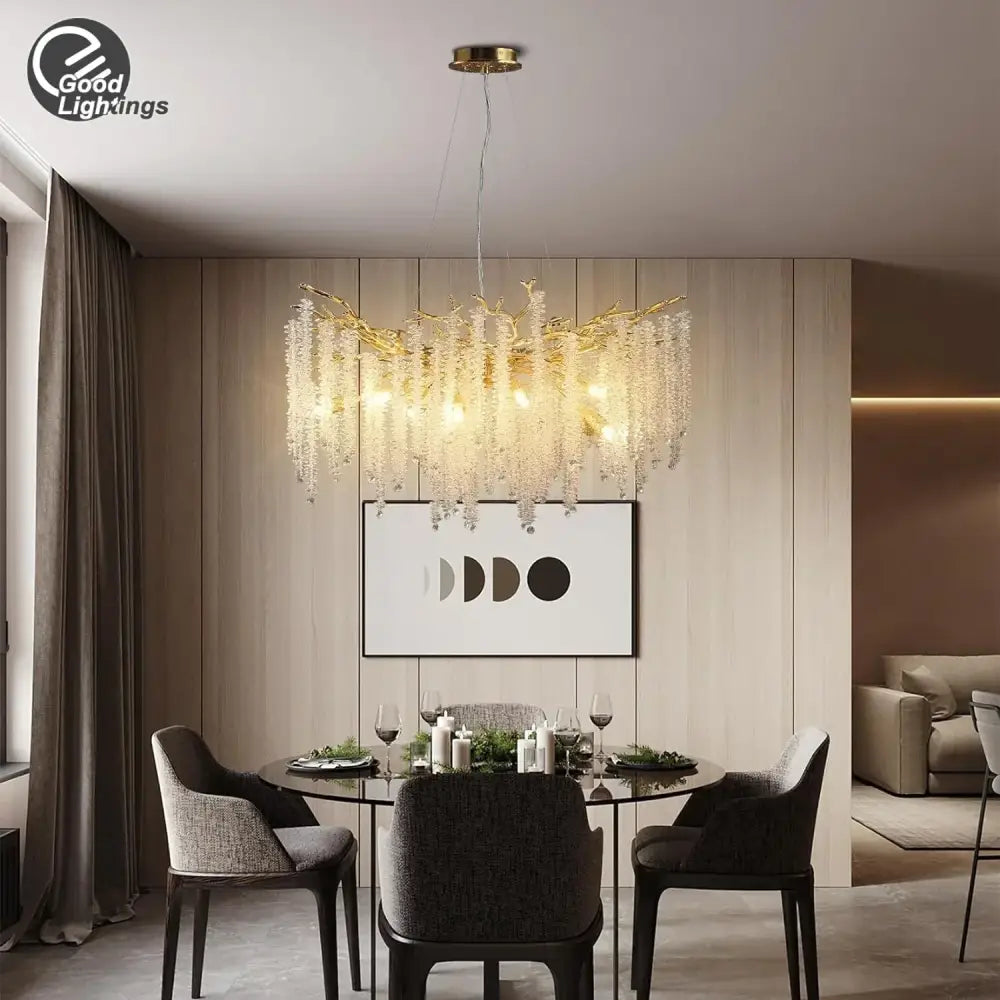 Modern gold round crystal branches chandelier featuring gold-toned metal and cascading crystal droplets for dining room decorbites gold round lighting