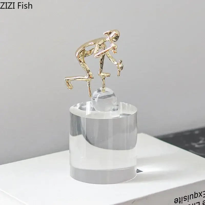 Modern gold runner crystal sculpture abstract statue in gold color on clear base for living room decorbites crystal sculpture