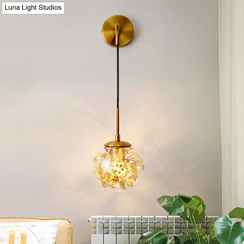 Modern gold shattered leaf clear glass globe light fixture with delicate floral etchings and brass wall mount for bedroom
