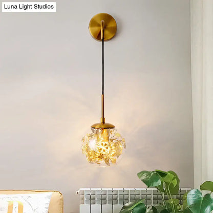 Modern gold shattered leaf clear glass globe light fixture with delicate floral etchings and brass wall mount for bedroom