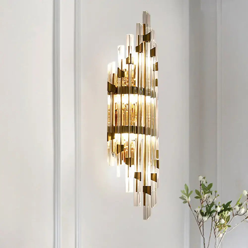 Modern gold shield 3-light wall sconce with vertical glass and gold metal rods for living room lighting