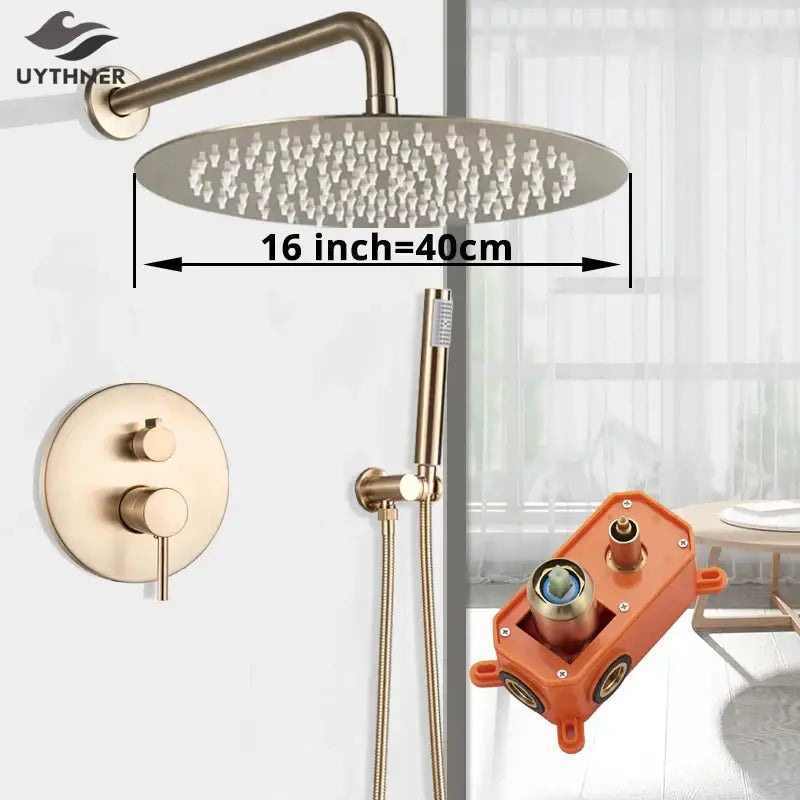 Brass-finished 16-inch round rainfall shower head with multiple nozzles and gold shower faucet wall controls by Decorbites