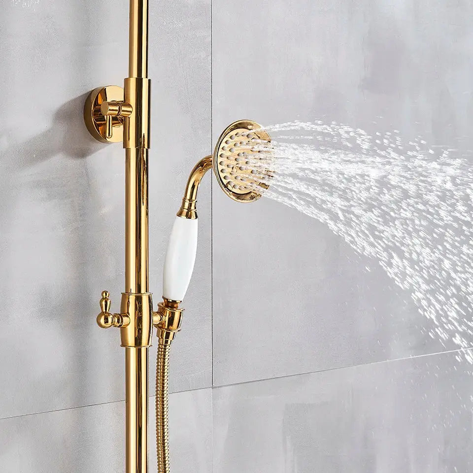 Modern gold shower faucet set with ceramic handles and brass accents featuring a gold-finished shower faucet set