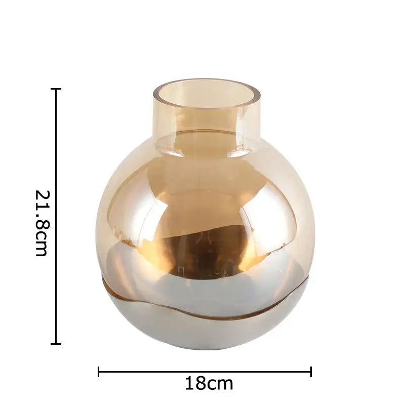 A sleek translucent amber glass vase with rounded body and narrow neck for modern gold and silver decorbites amber glass decor