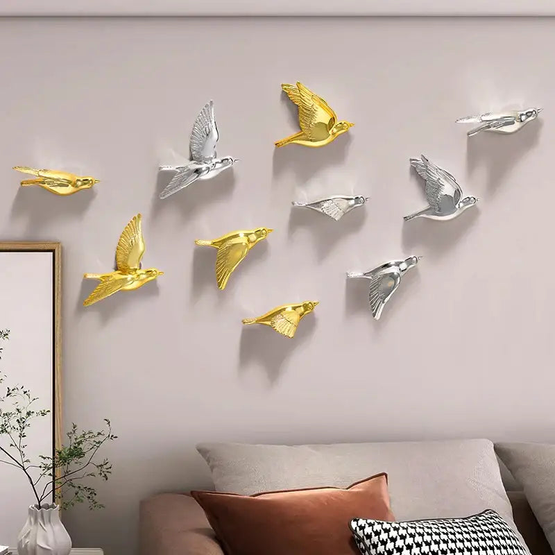 Set of modern gold and silver metallic bird resin statue wall decor for children’s room with minimalist design