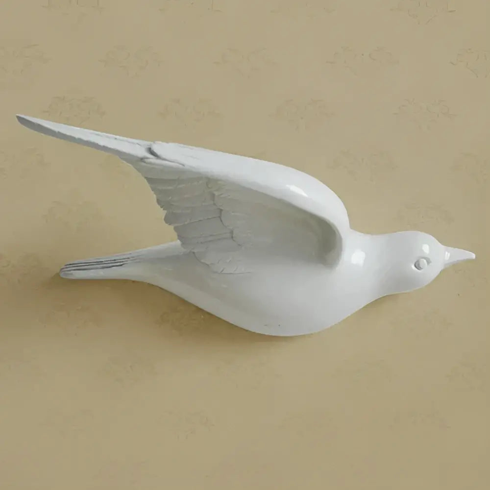 White ceramic dove bird resin statue wall decor with detailed feathering and glossy finish for children’s room