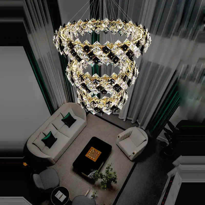 Modern gold and silver crystal dimmable led chandelier with gold metal frame and clear and black prisms for dining room decorbites