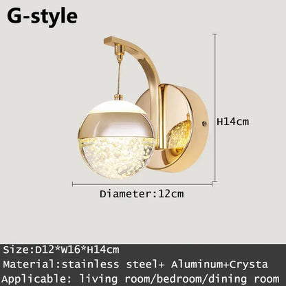 Modern gold and silver crystal led wall sconce with a gold-toned polished metal frame and spherical crystal globe decorbites crystal led