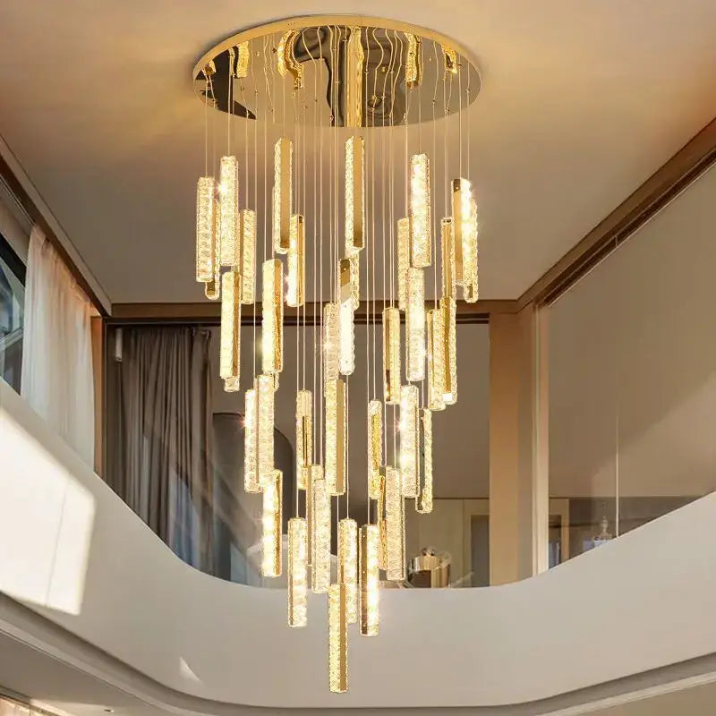 Modern gold and silver decorbites crystal chandelier with cascading cylindrical rods for dining room lighting