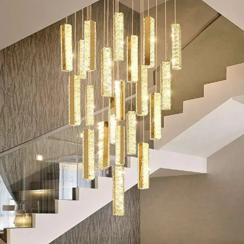 Modern gold and silver decorbites crystal chandelier with cascading cylindrical pendants for dining room lighting