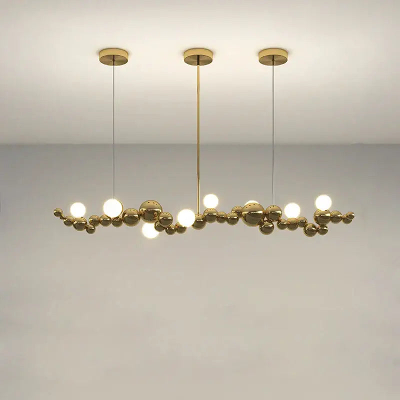 Modern gold and silver dimmable led hanging pendant light with a gold-toned branching spherical bulb cluster for dining room decorbites dimmable led