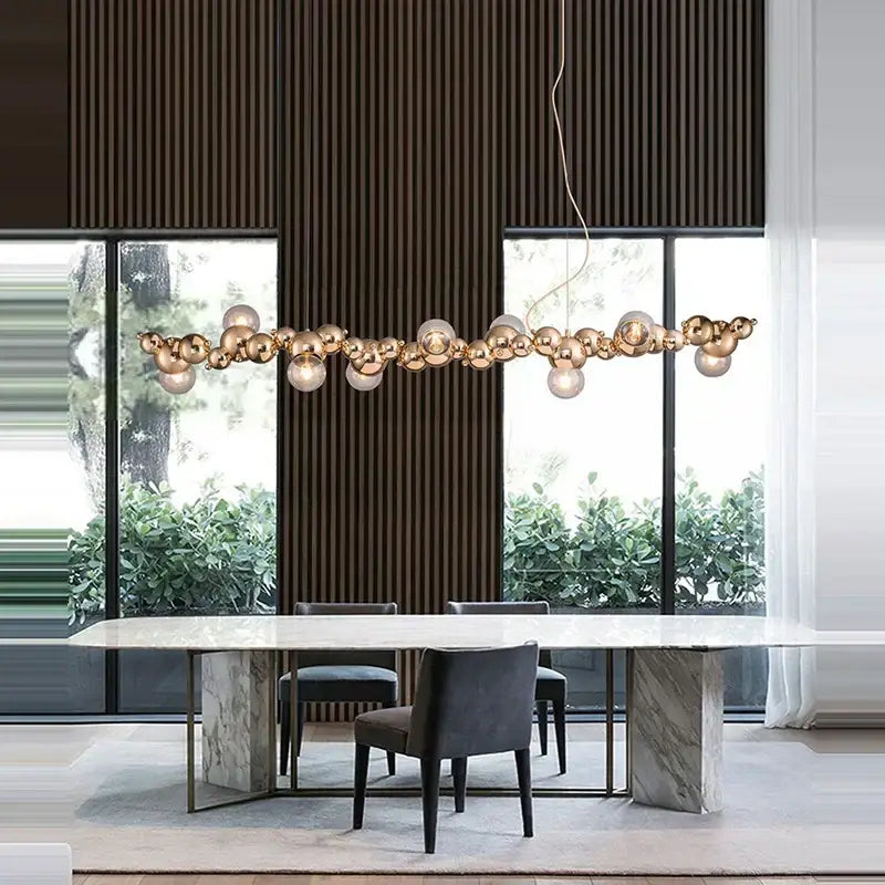 Modern gold-toned spherical pendant light with a clustered design dimmable led hanging by decorbites for dining room decor