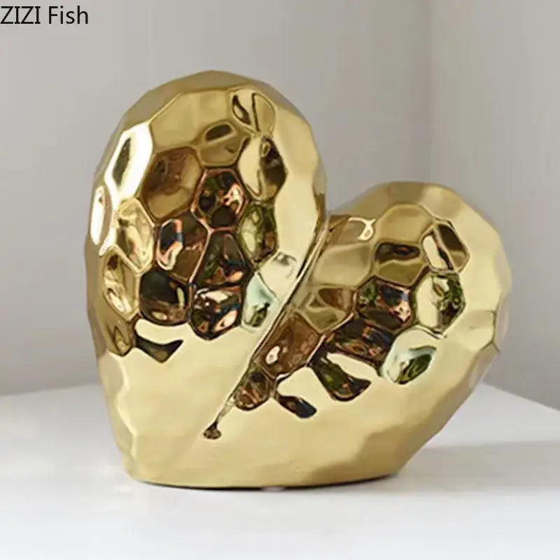 Modern gold faceted ceramic statue with honeycomb texture decorbites golden heart for stylish home decor