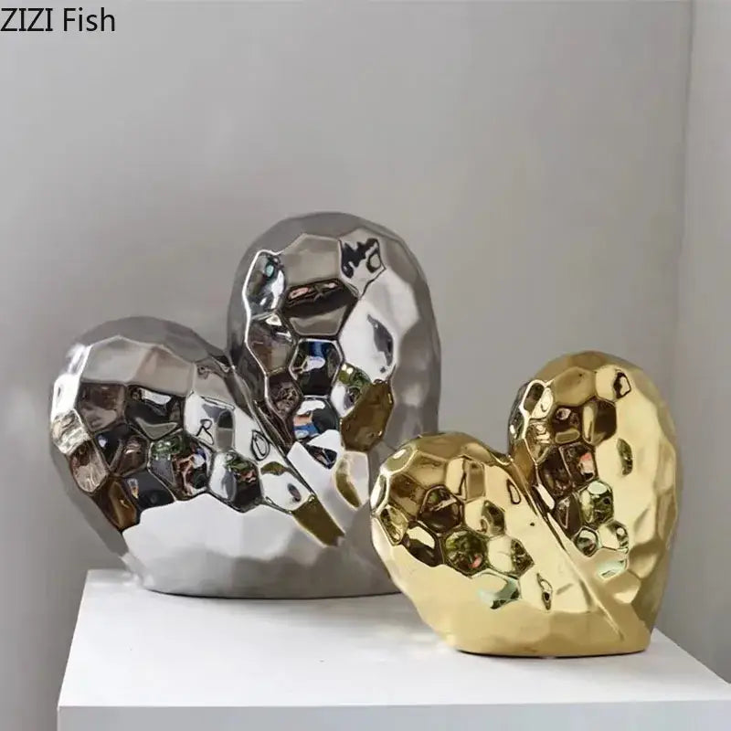 Modern gold and silver faceted ceramic statue heart sculptures for home decor by DecorBites golden heart collection