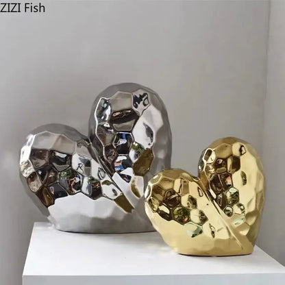 Modern gold and silver faceted ceramic statue heart sculptures for home decor by DecorBites golden heart collection
