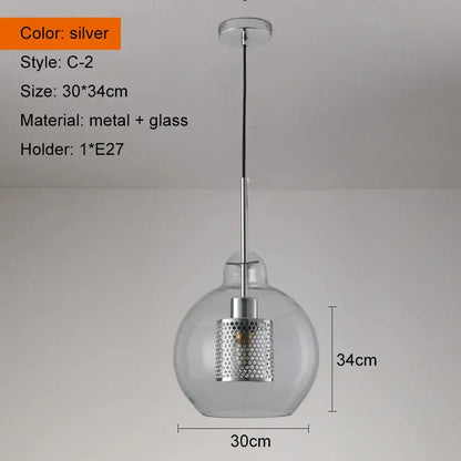 Modern gold and silver honeycomb glass pendant light with a silver perforated metal shade and clear ball glass pendant globe
