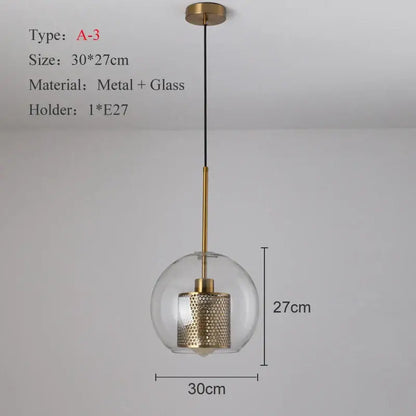 Modern gold and silver honeycomb glass pendant light with gold-toned spherical ball glass pendant and perforated shade