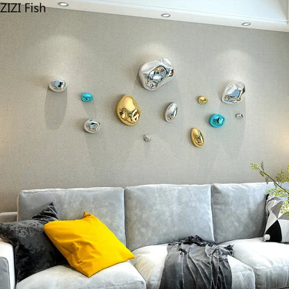 Shiny irregular gold and silver metallic rock wall hanging ornaments with reflective surfaces for living room decor