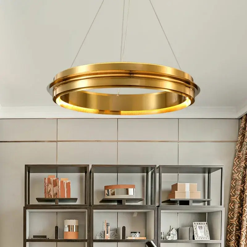 A modern decorbites gold ring chandelier pendant light with polished gold finish and concentric ring design for living rooms