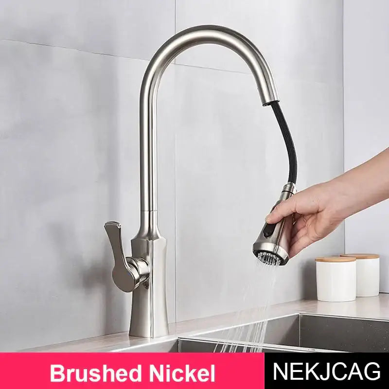 Brushed nickel kitchen faucet with sleek arched spout and pull-out spray head for DecorBites gold single handle decor