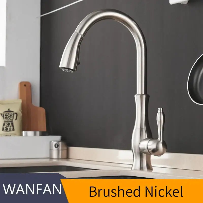 Modern gold single handle pull out kitchen faucet with brushed nickel finish and sleek arched spout pull-down spray head