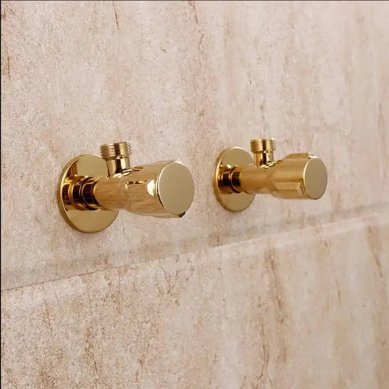 Modern gold solid brass triangle valve bathroom faucet fixture with two sleek wall-mounted gold brass faucets and circular handles