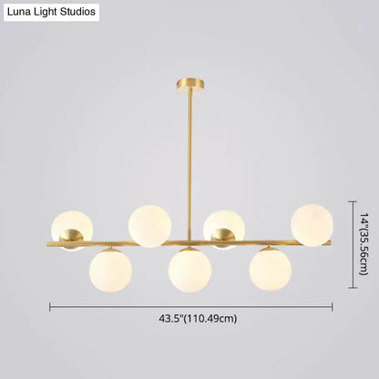 Modern gold spherical island ceiling light with six frosted glass globe pendant lighting for dining room use