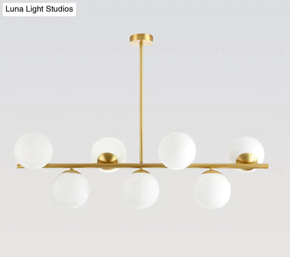 Modern gold spherical island ceiling light with six frosted glass globe shades pendant lighting for dining room