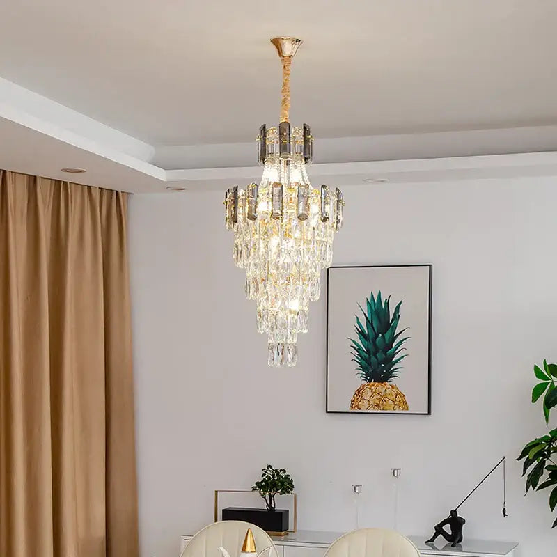 Modern gold spiral decorbites crystal chandelier pendant light with multi-tiered clear glass prisms and gold-toned frame