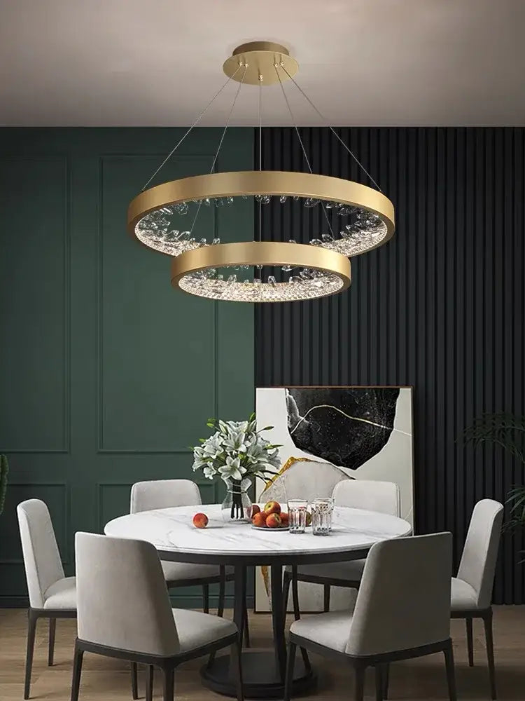 Modern gold spiral decorbites crystal led chandelier with gold-toned double-ring and embedded crystal accents for dining room light