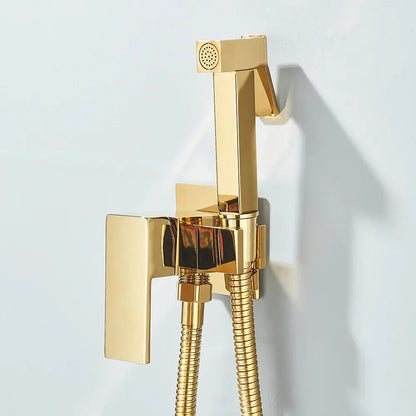 Modern gold square bidet shower faucet with a sleek rectangular handle and flexible hose for wall-mounted use