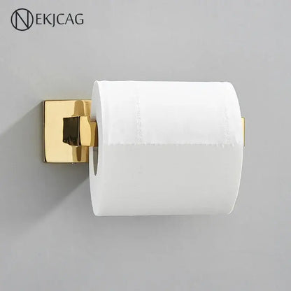 Gold-finished modern gold square paper holder wall mount holding a standard white toilet paper roll for bathroom use