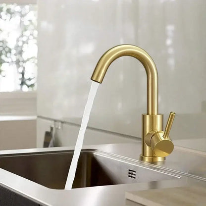 Modern gold stainless steel basin faucet with sleek curved spout and cylindrical handle for bathroom use decorbites gold stainless