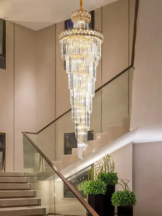 Modern gold stainless steel crystal chandelier with cascading clear and gold glass tiers for staircase lighting decorbites gold stainless