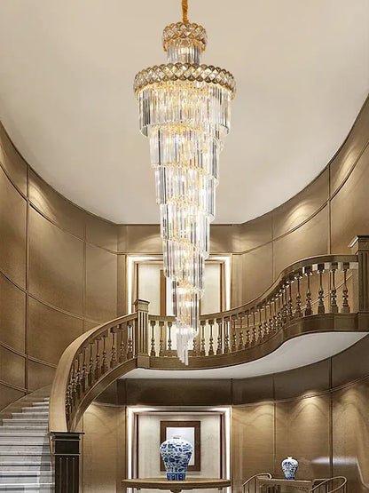 Modern gold stainless steel crystal chandelier with cascading clear glass prisms for staircase lighting decorbites gold stainless